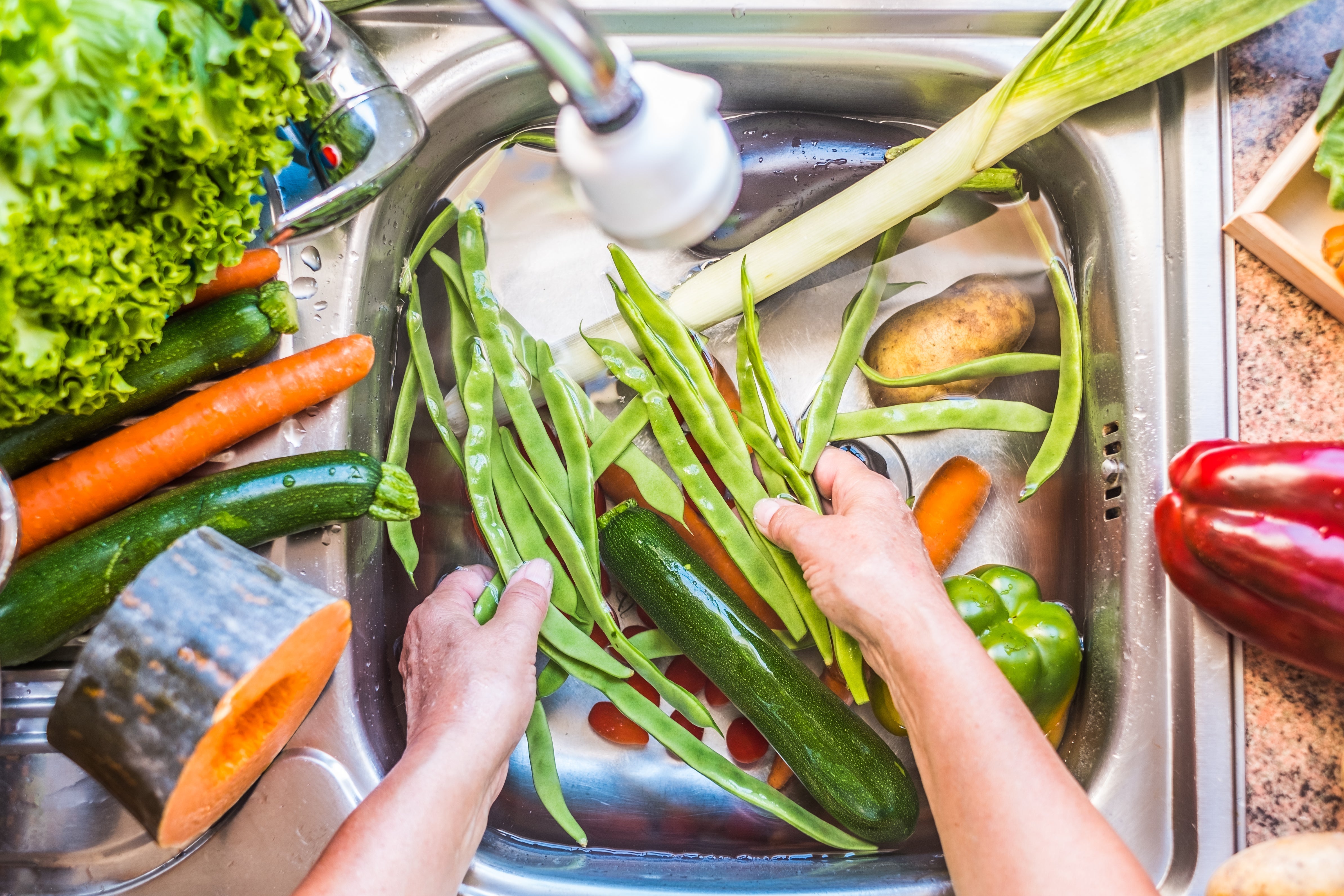 The Convenience of an Outdoor Kitchen Sink Cabinet. Keep the Mess Outside.