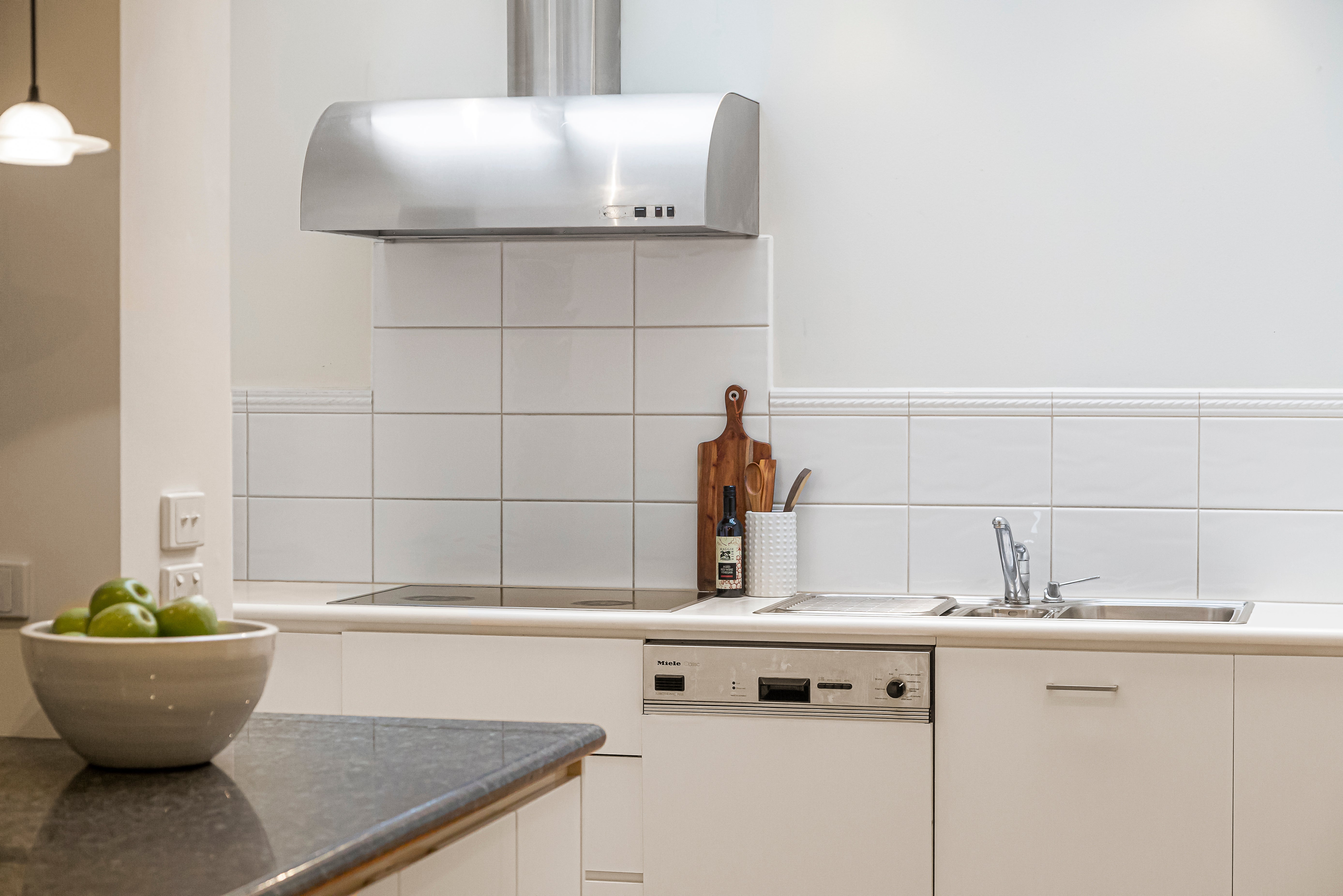 A Stainless Steel Kitchen Hood as a Focal Point