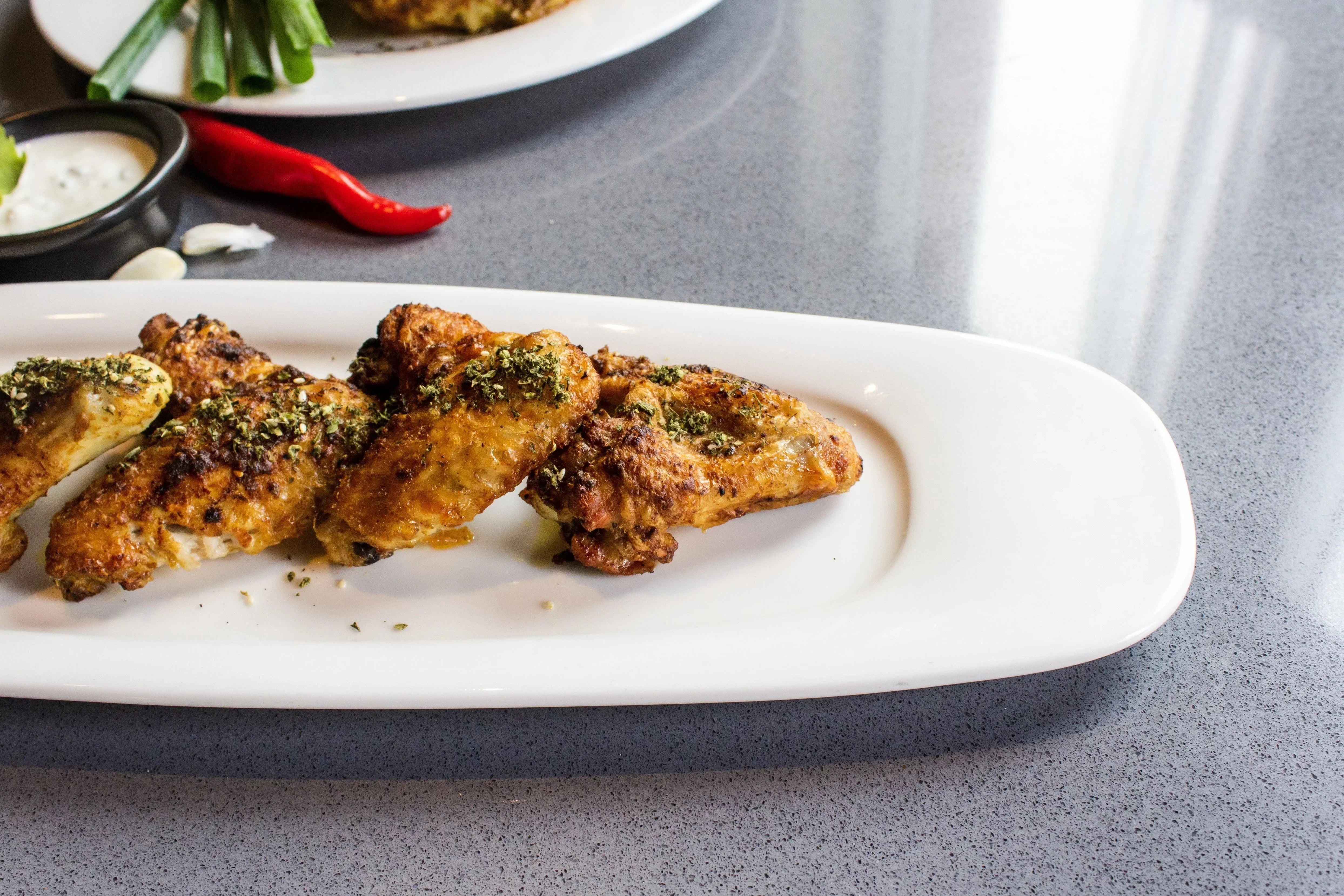 Garlic Parmesan Chicken Wings with Basil Pesto
